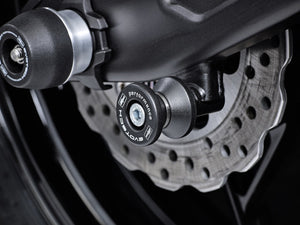 EP Paddock Stand Bobbins inserted into the offside swingarm of the Kawasaki Z650.