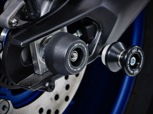 The rear wheel of the Yamaha Tracer 900 GT with EP Spindle Bobbins Crash Protection bobbin fitted to the rear spindle offering swingarm protection. 